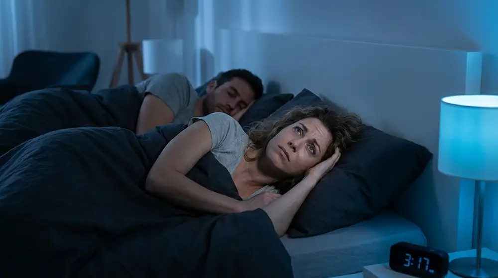 Personne réveillée la nuit à cause des mouvements de son partenaire dans le lit